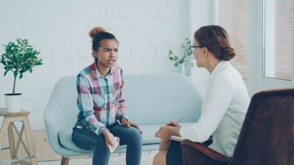 Therapist and client in conversation during a counseling session